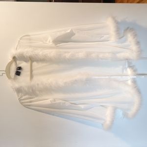 White feather trimmed robed